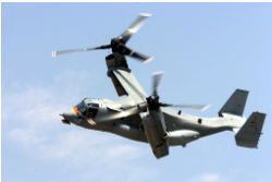 Tilt rotor aircraft shown in a vertical lift configuration.